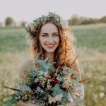 beautiful-young-bride-at-sunset-in-green-nature-PDXVRCK.jpg